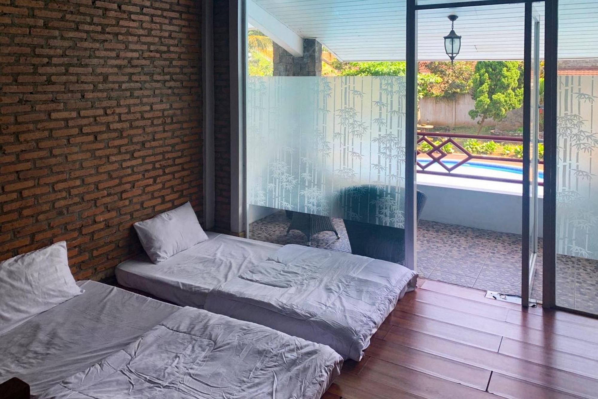 Urbanview Hotel Villa Q Gisting Bandjarnegeri Экстерьер фото